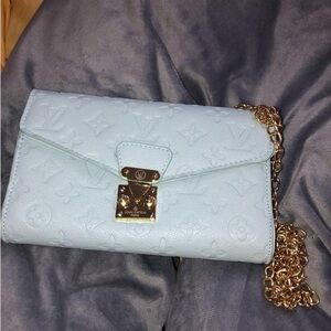 Louis Vuitton Pastel Blue Embossed Clutch